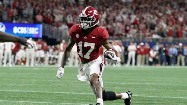 Dec 2, 2023; Atlanta, GA, USA; Alabama Crimson Tide wide receiver Isaiah Bond (17) runs for a touchdown against the Georgia Bulldogs in the fourth quarter at Mercedes-Benz Stadium. Mandatory Credit: Brett Davis-USA TODAY Sports